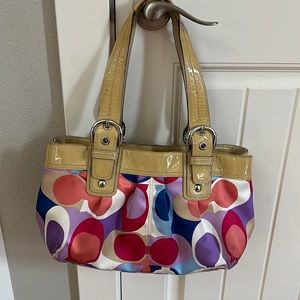 Authentic Coach scarf print bag and lavender Coach wallet.